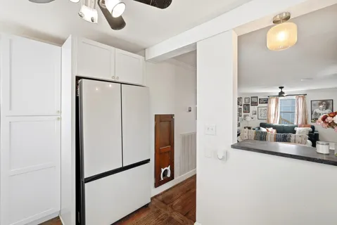 a view of a living room and hardwood floor