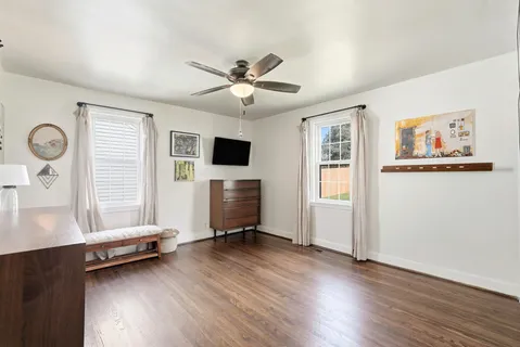 a view of livingroom with furniture wooden floor and window