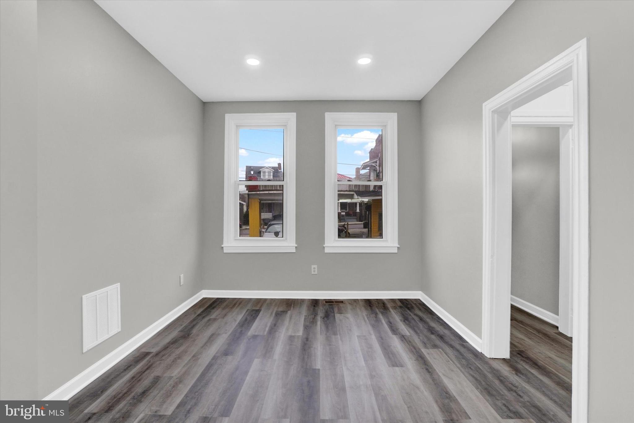 359 East Prospect Street York, PA 17403 - Photo 11 of 27 wooden floor in an empty room with a window
