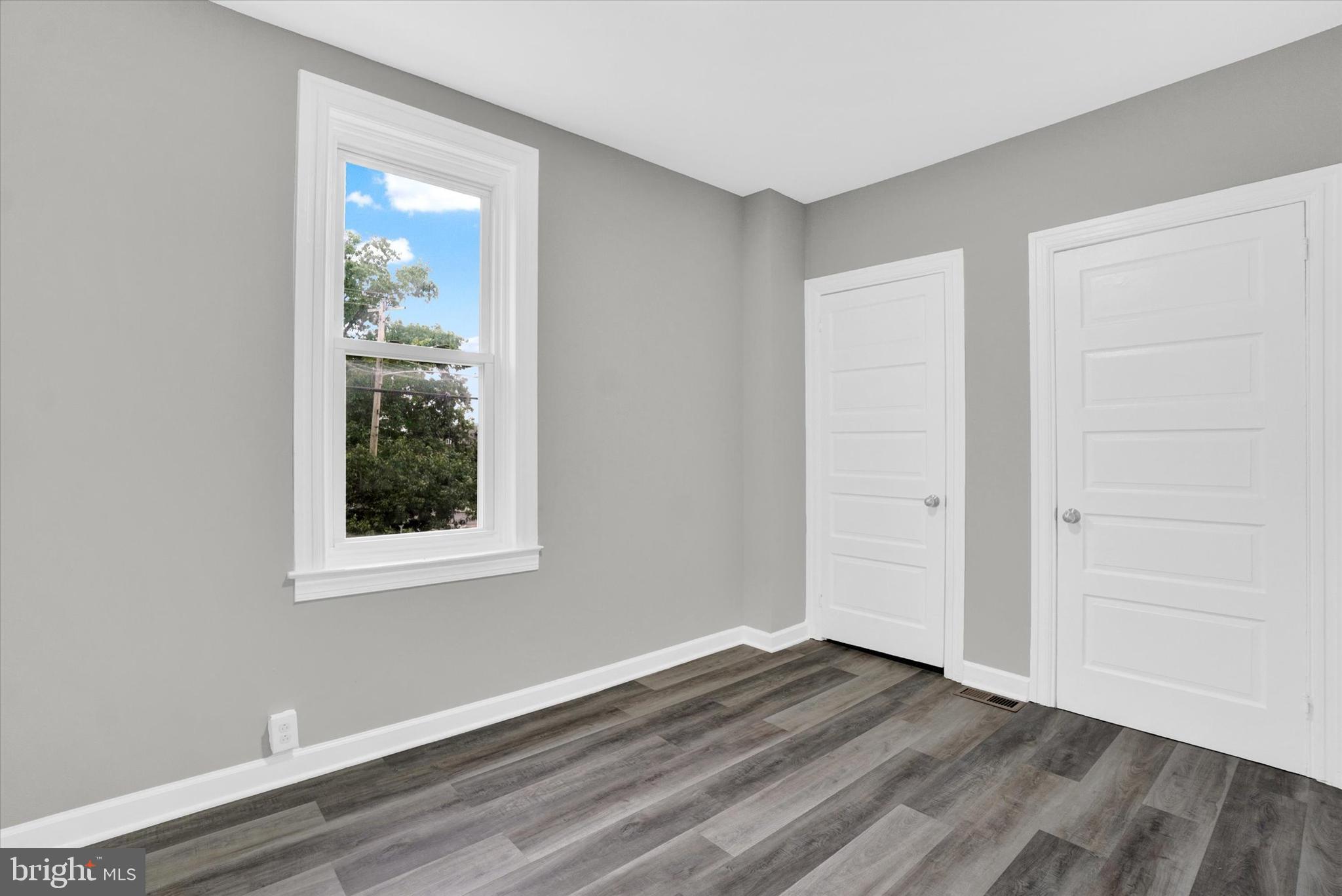 359 East Prospect Street York, PA 17403 - Photo 16 of 27 a view of an empty room with wooden floor and a window