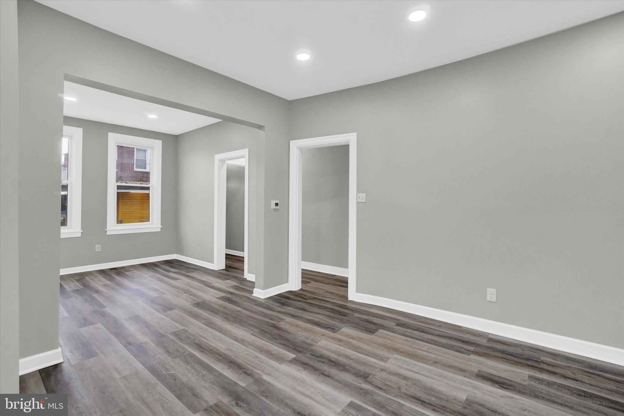 359 East Prospect Street York, PA 17403 - Photo 18 of 27 an empty room with wooden floor and windows
