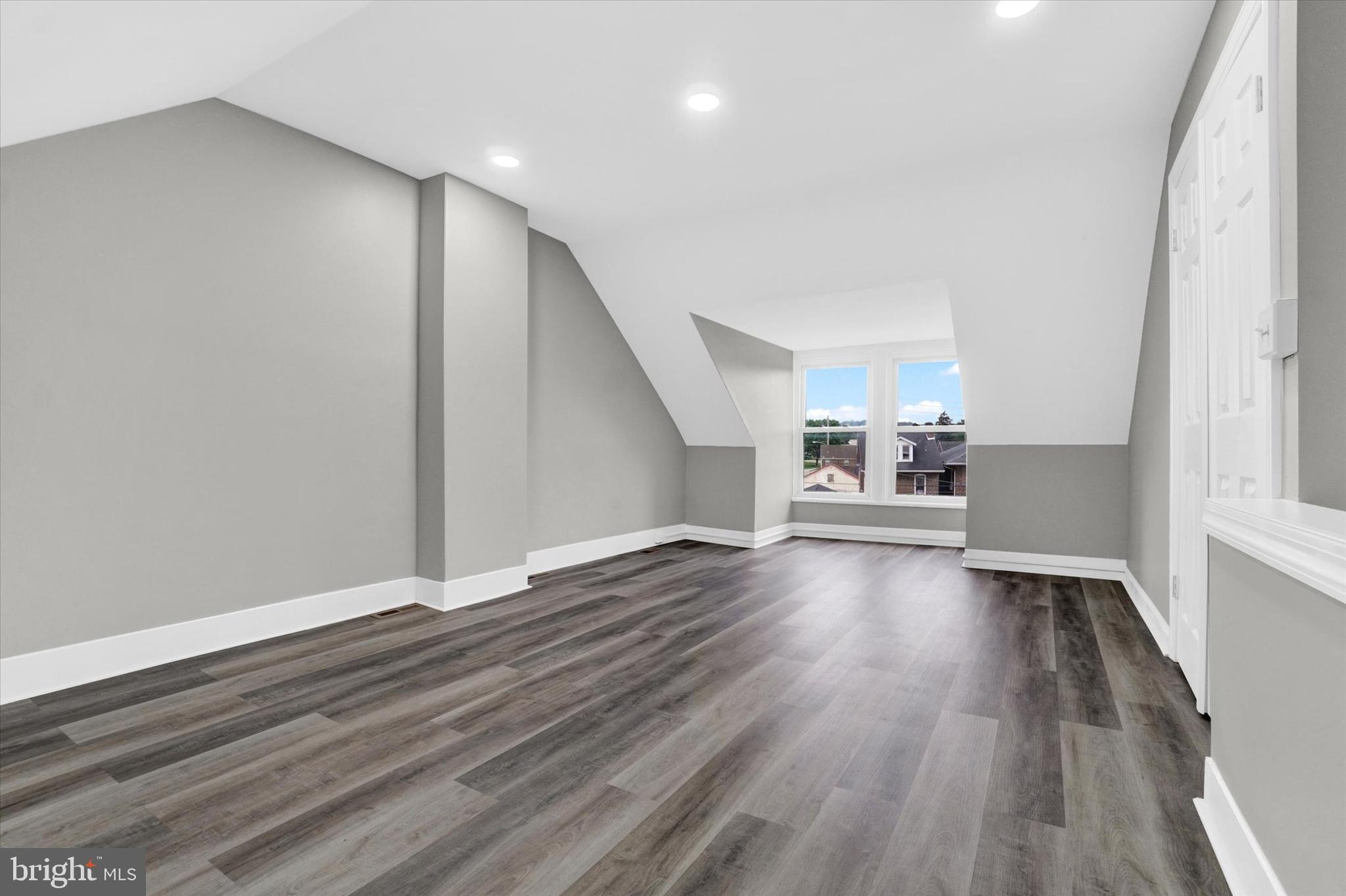 359 East Prospect Street York, PA 17403 - Photo 19 of 27 wooden floor in an empty room with a window