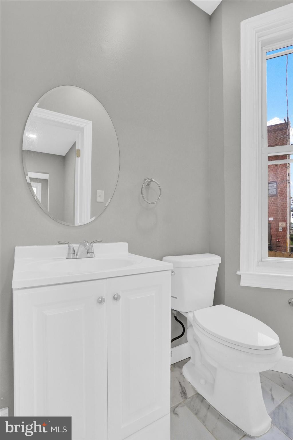 359 East Prospect Street York, PA 17403 - Photo 22 of 27 a bathroom with a sink a toilet and mirror