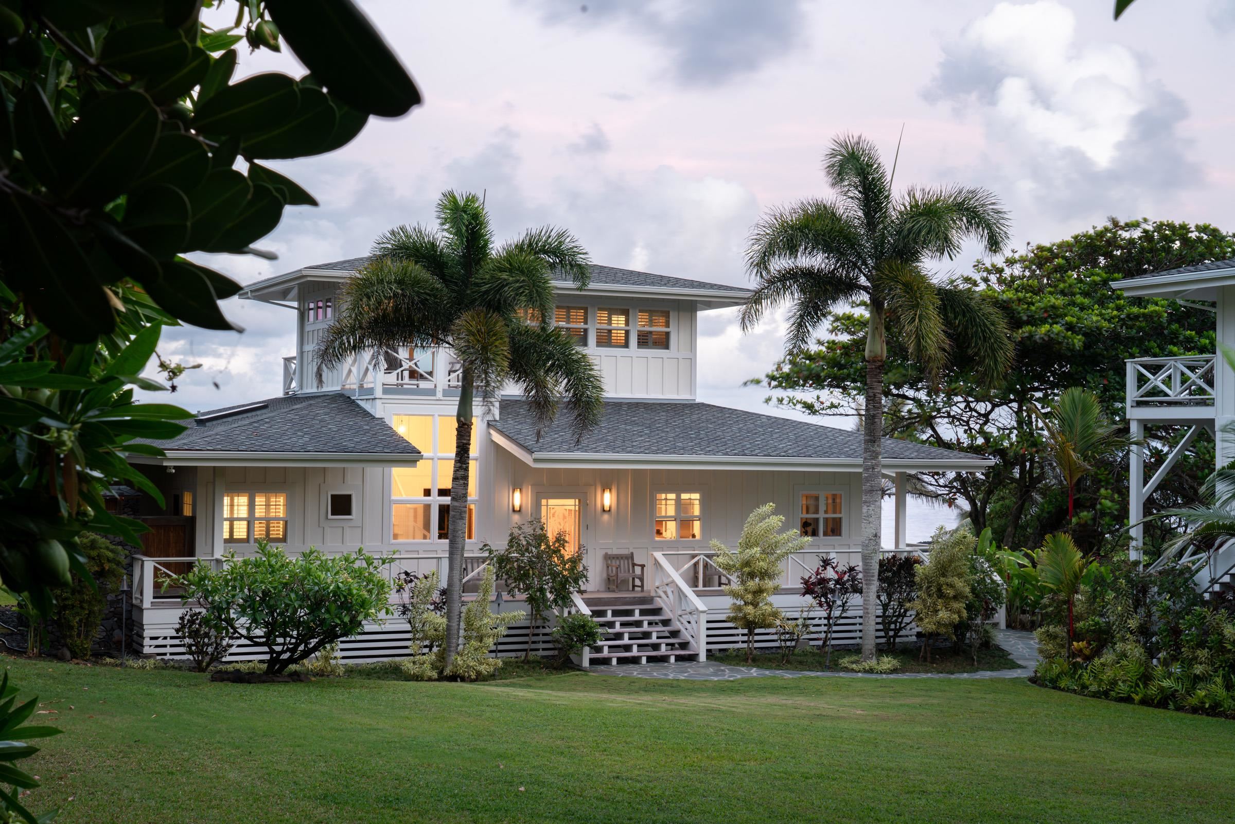 51 Kapohue Road Hana, HI 96713 - Photo 49 of 50 a front view of a house with a yard