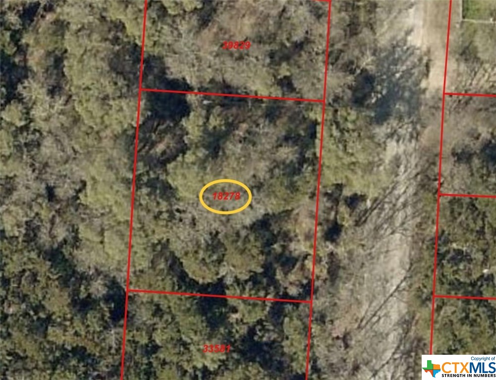 a view of electric pole on a street