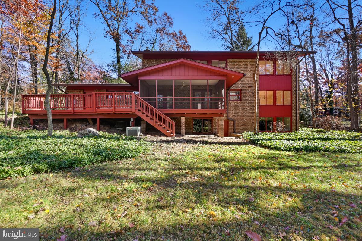 2606 Deerdell Lane Reston, VA 20191 - Photo 49 of 49 a front view of a house with garden