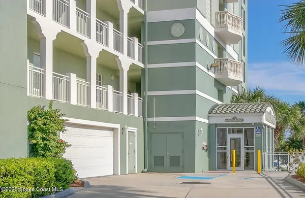 a house with a potted plant in front of it