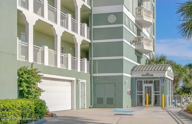 a house with a potted plant in front of it
