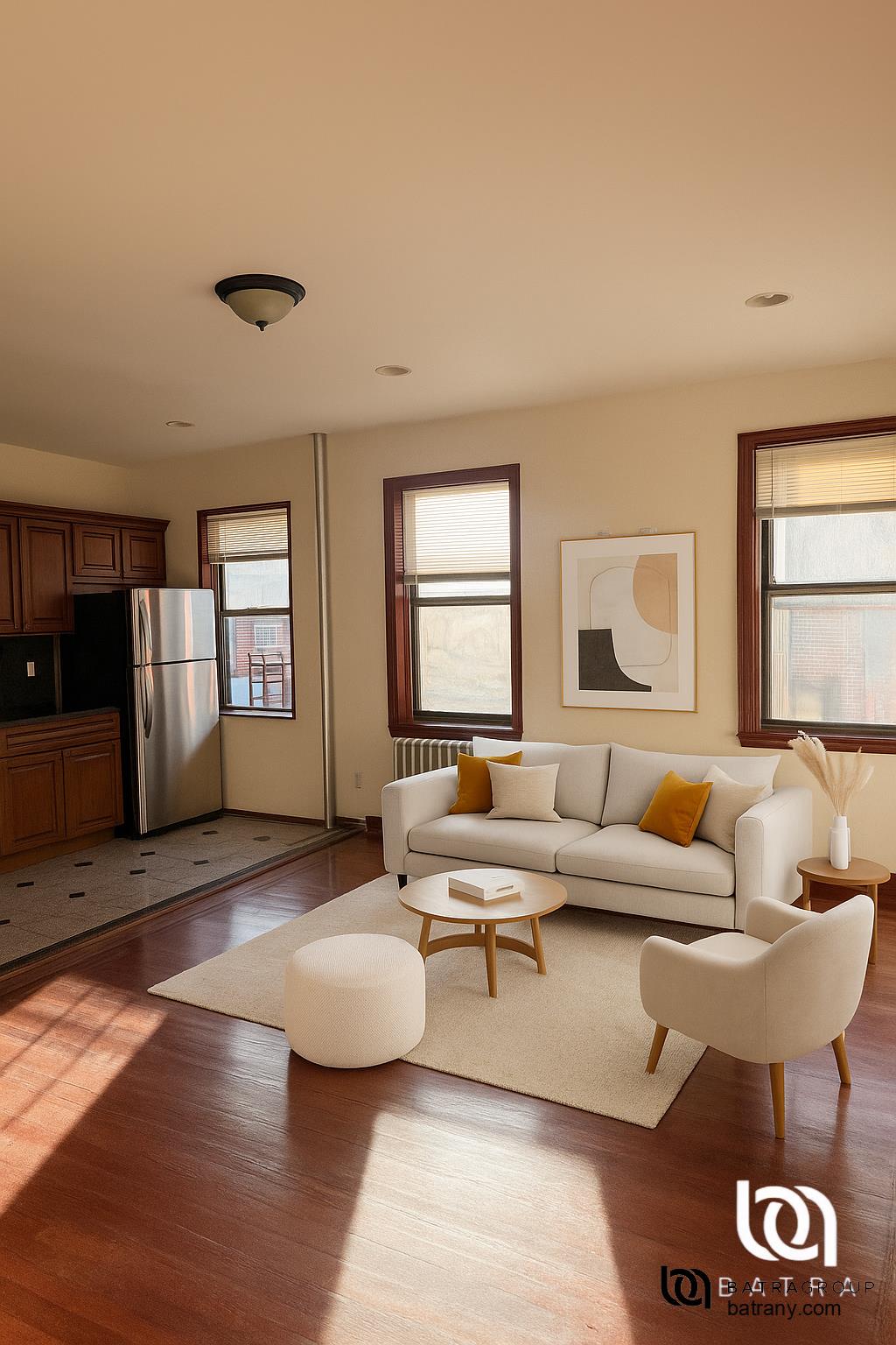 39-11 62nd Street, Unit 2 Queens, NY 11377 - Photo 2 of 7 a living room with furniture and wooden floor