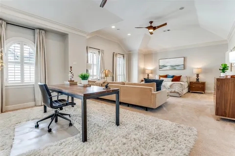 a bedroom with bed and window