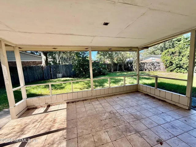 a view of swimming pool with a yard