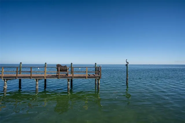 a view of a deck with chairs