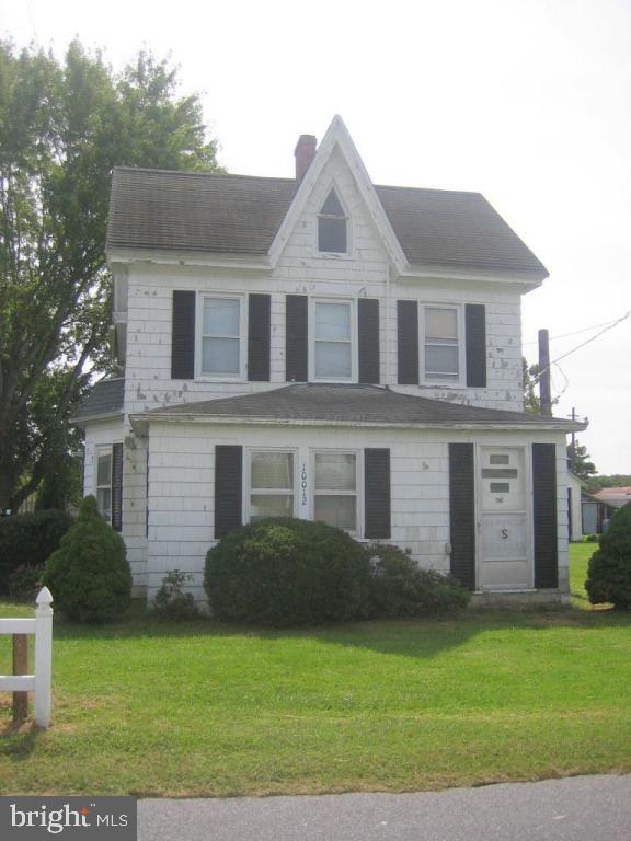10012 Pitts Road Showell, MD 21862 - Photo 1 of 18 a front view of a house with a garden