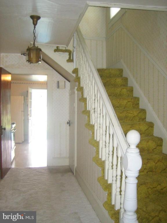 10012 Pitts Road Showell, MD 21862 - Photo 2 of 18 a view of entryway and hall with wooden floor