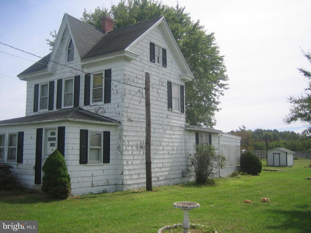 10012 Pitts Road Showell, MD 21862 - Photo 15 of 18 a front view of a house with a yard