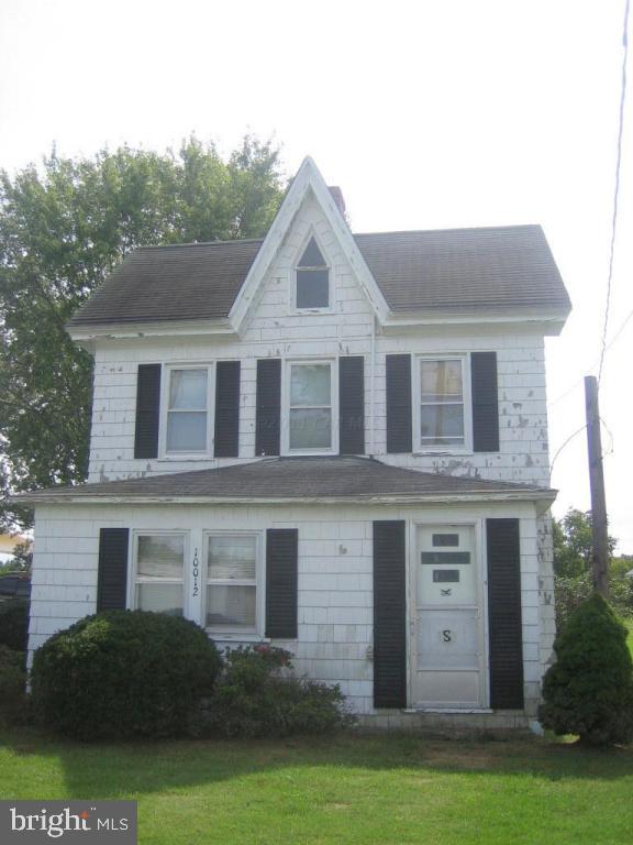 10012 Pitts Road Showell, MD 21862 - Photo 18 of 18 a front view of a house with a garden