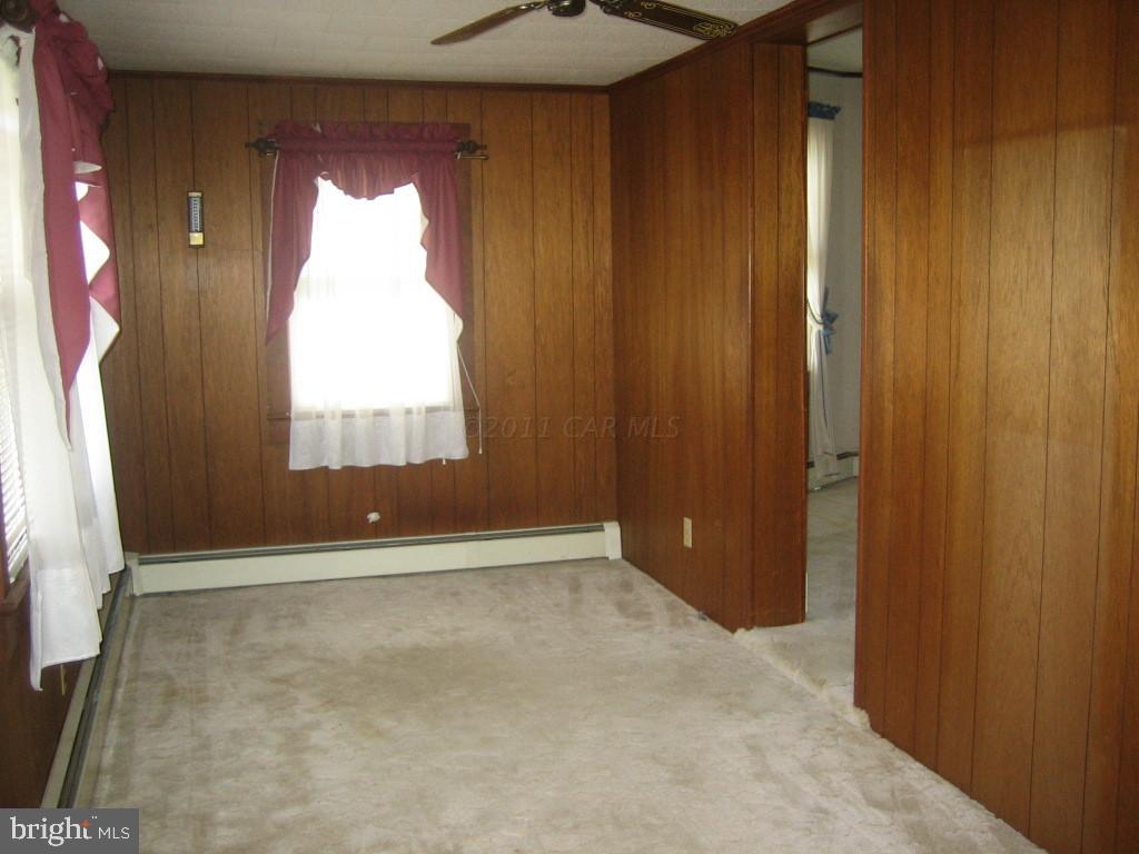 10012 Pitts Road Showell, MD 21862 - Photo 6 of 18 an empty room with a window