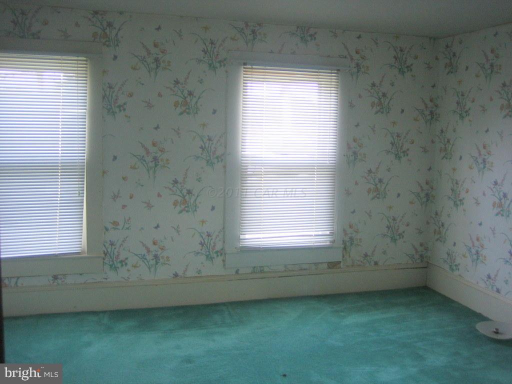 10012 Pitts Road Showell, MD 21862 - Photo 9 of 18 an empty room with a window