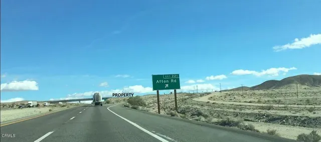 a view of a city street from a balcony