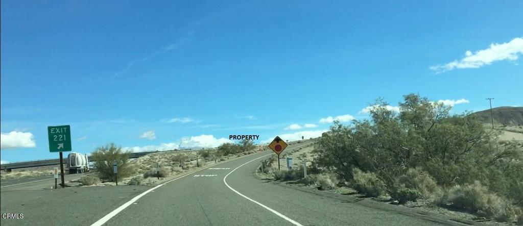 45215 East Afton Canyon Road Baker, CA 92309 - Photo 16 of 29 a view of a street with a building in the background