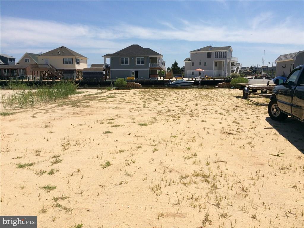 48 Tarpon Road Tuckerton, NJ 08087 - Photo 2 of 5 a front view of a house with a yard