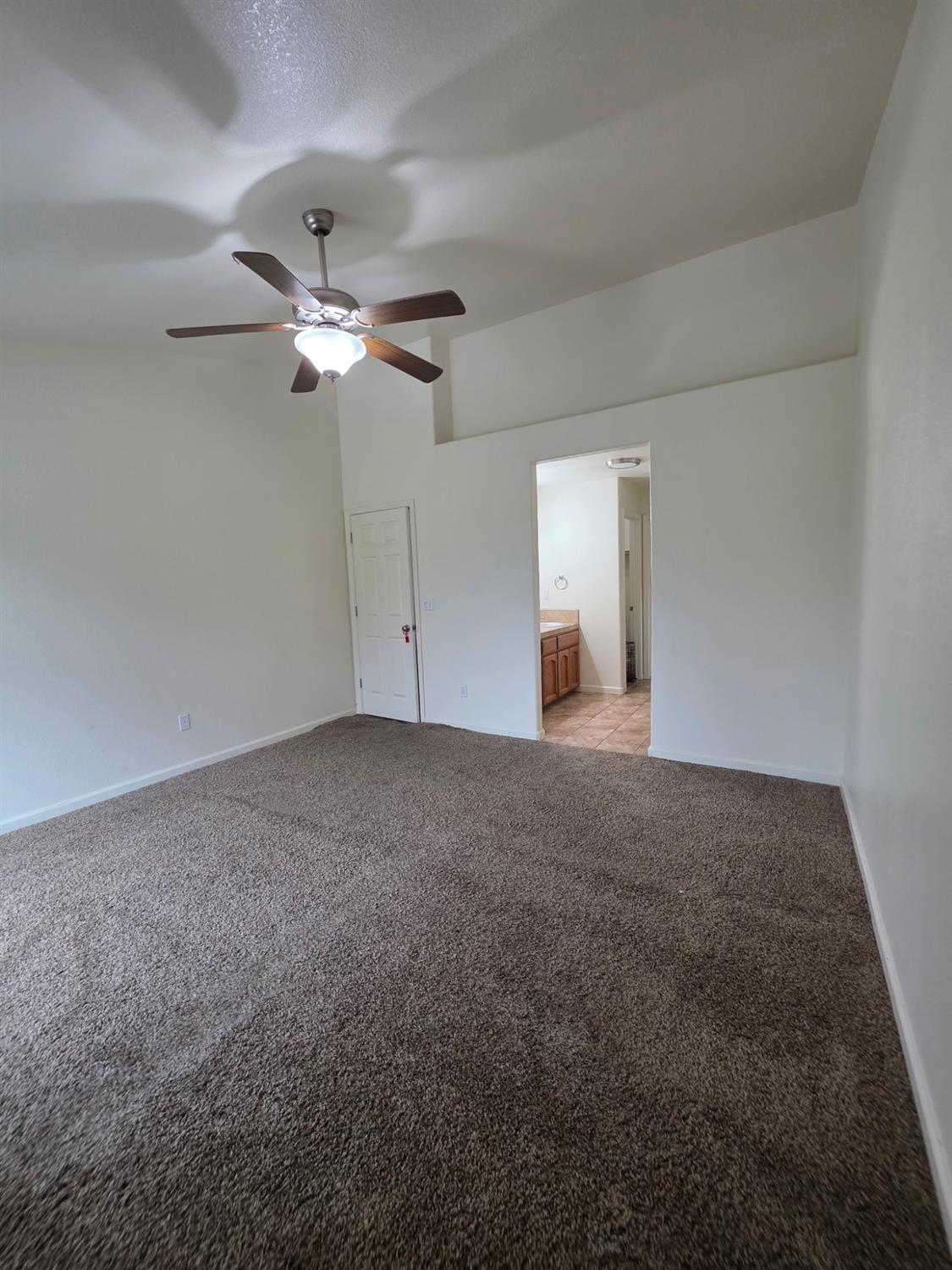 804 Morris Lane Madera, CA 93637 - Photo 4 of 17 a view of a big room with carpet