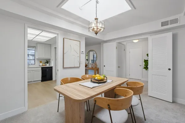a view of a dining room with furniture