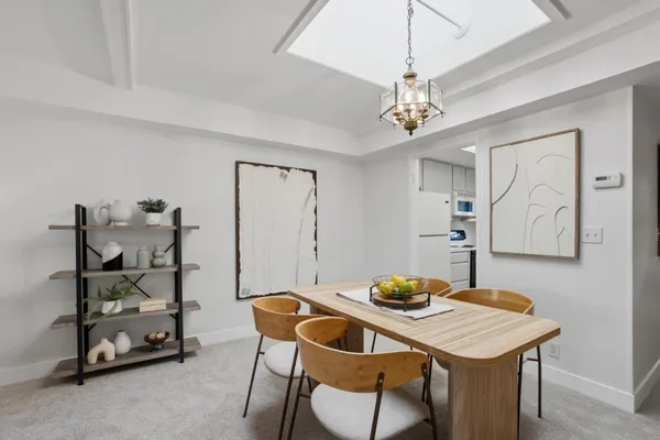 a view of a dining room with furniture