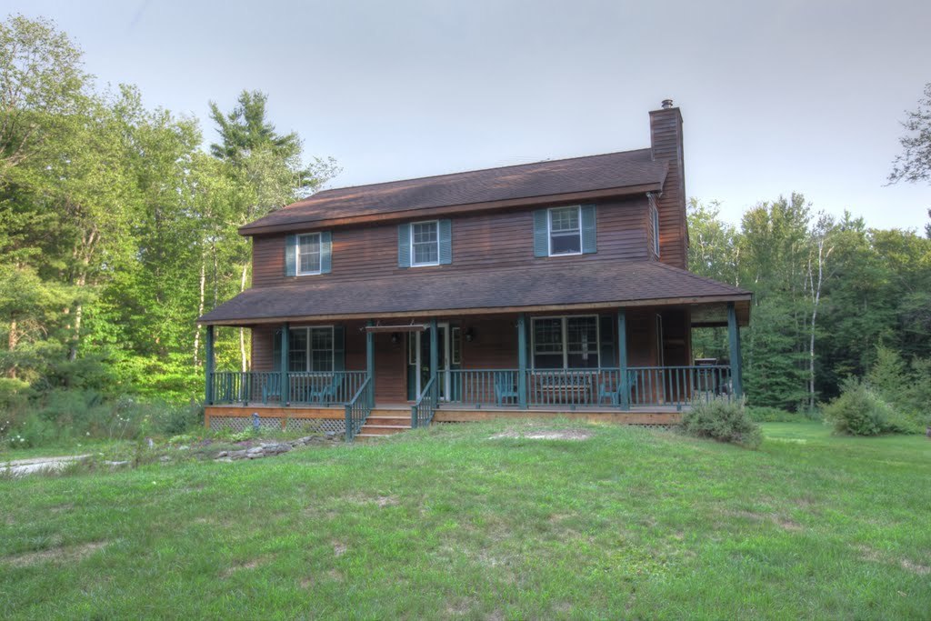 9 Stump Road Sandisfield, MA 01255 - Photo 2 of 29 a front view of a house with garden