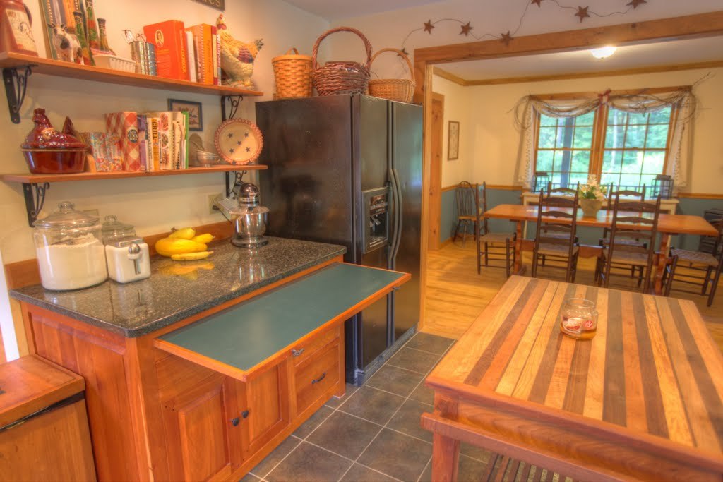 9 Stump Road Sandisfield, MA 01255 - Photo 16 of 29 a dining room with furniture and a floor to ceiling window