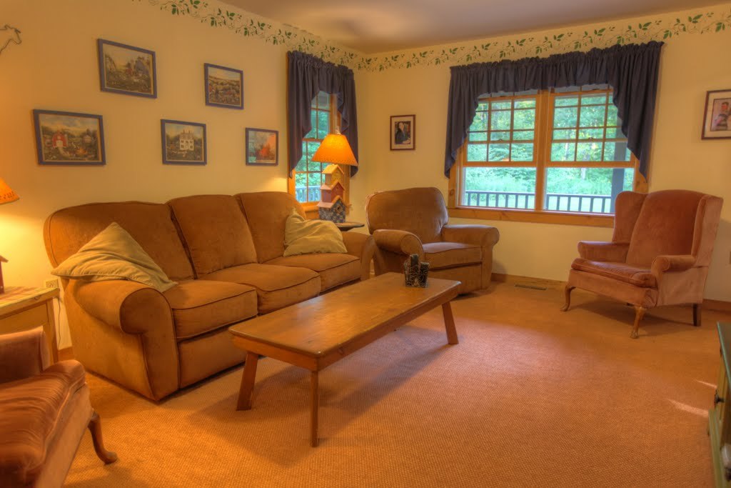 9 Stump Road Sandisfield, MA 01255 - Photo 20 of 29 a living room with furniture and a window