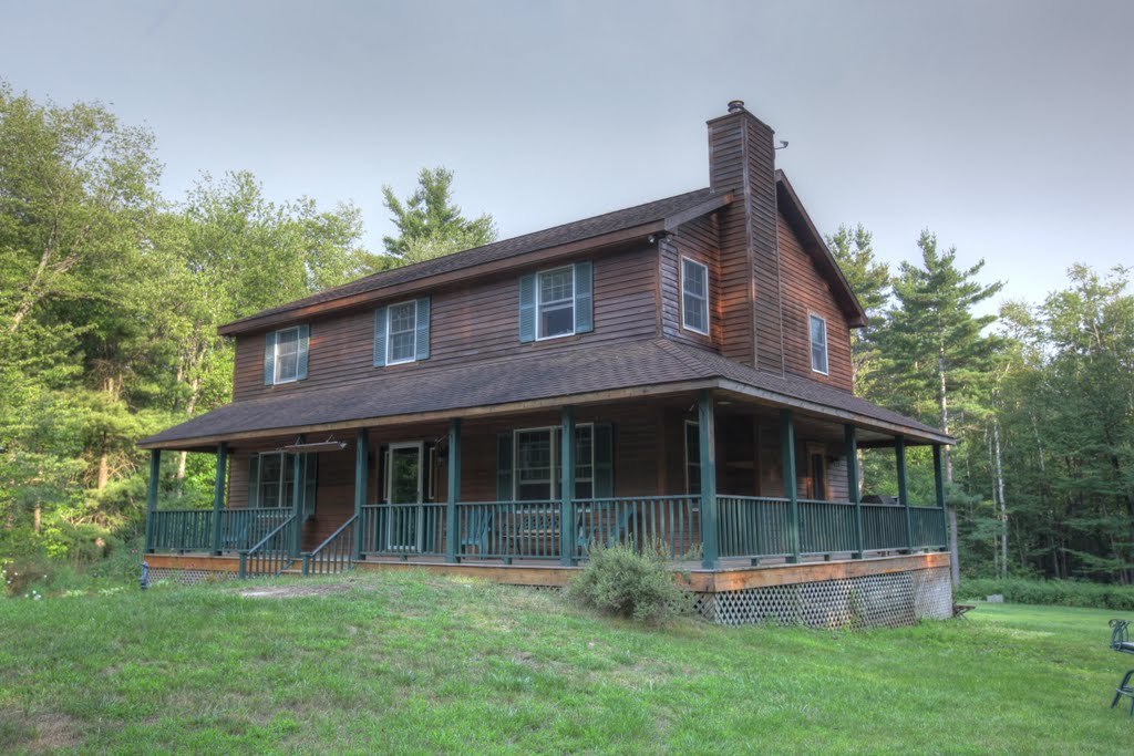9 Stump Road Sandisfield, MA 01255 - Photo 3 of 29 a front view of a house with a yard