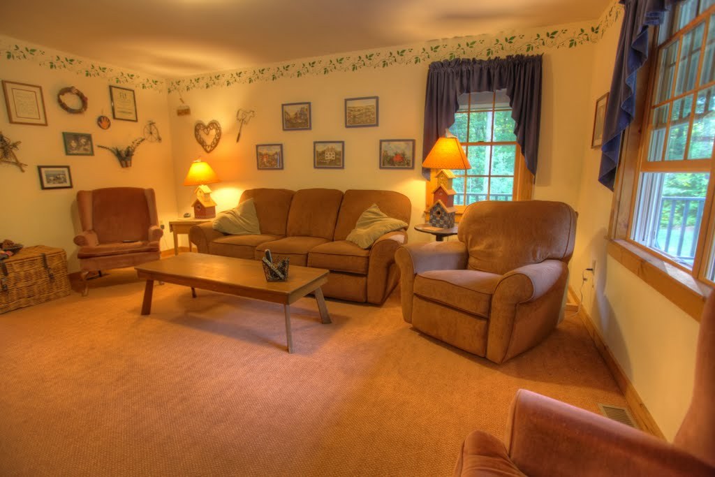 9 Stump Road Sandisfield, MA 01255 - Photo 21 of 29 a living room with furniture and a lamp