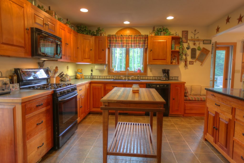 9 Stump Road Sandisfield, MA 01255 - Photo 10 of 29 a kitchen with stainless steel appliances granite countertop a sink a stove and a refrigerator