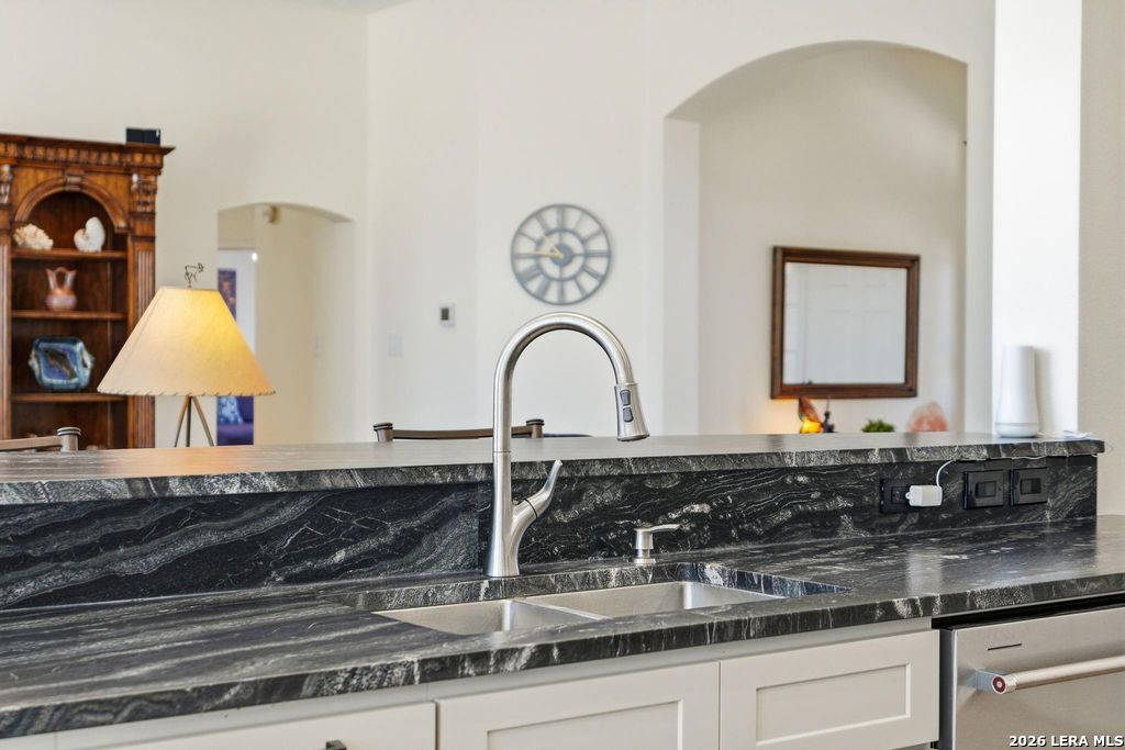 318 River Ridge Boerne, TX 78006 - Photo 14 of 46 a bathroom with a sink and a mirror