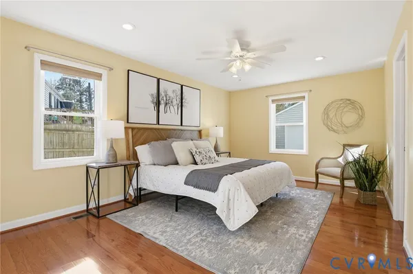 a bed room with a bed and a window
