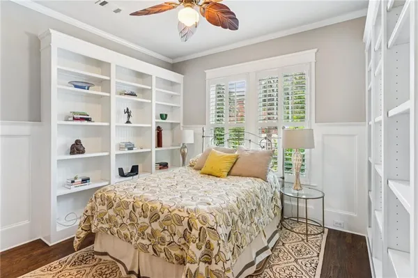 a kitchen with stainless steel appliances a cabinets and a window