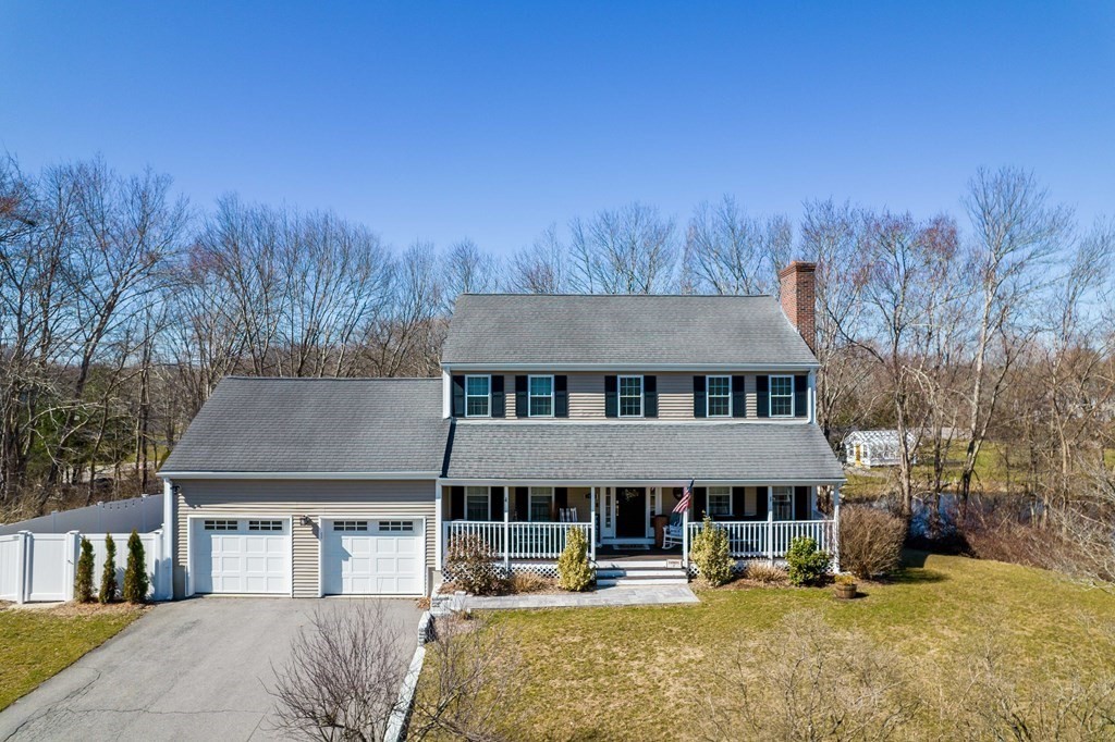a backyard of a house with seating space