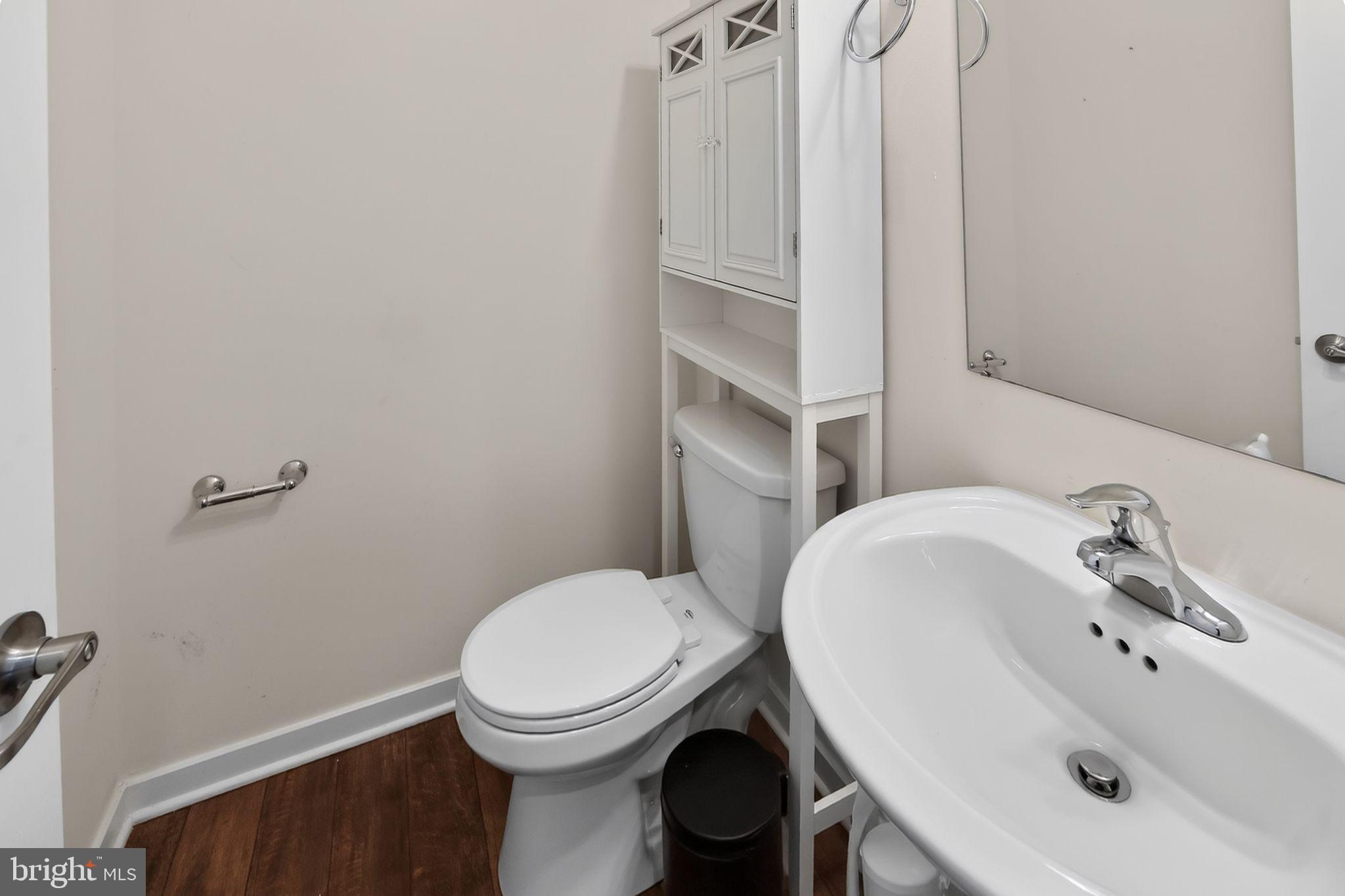 78 Wil-Be Drive Pottstown, PA 19465 - Photo 15 of 18 a bathroom with a sink a toilet and mirror