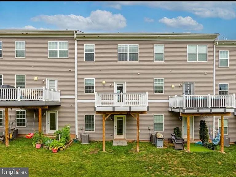 78 Wil-Be Drive Pottstown, PA 19465 - Photo 18 of 18 a front view of a residential apartment building with a yard