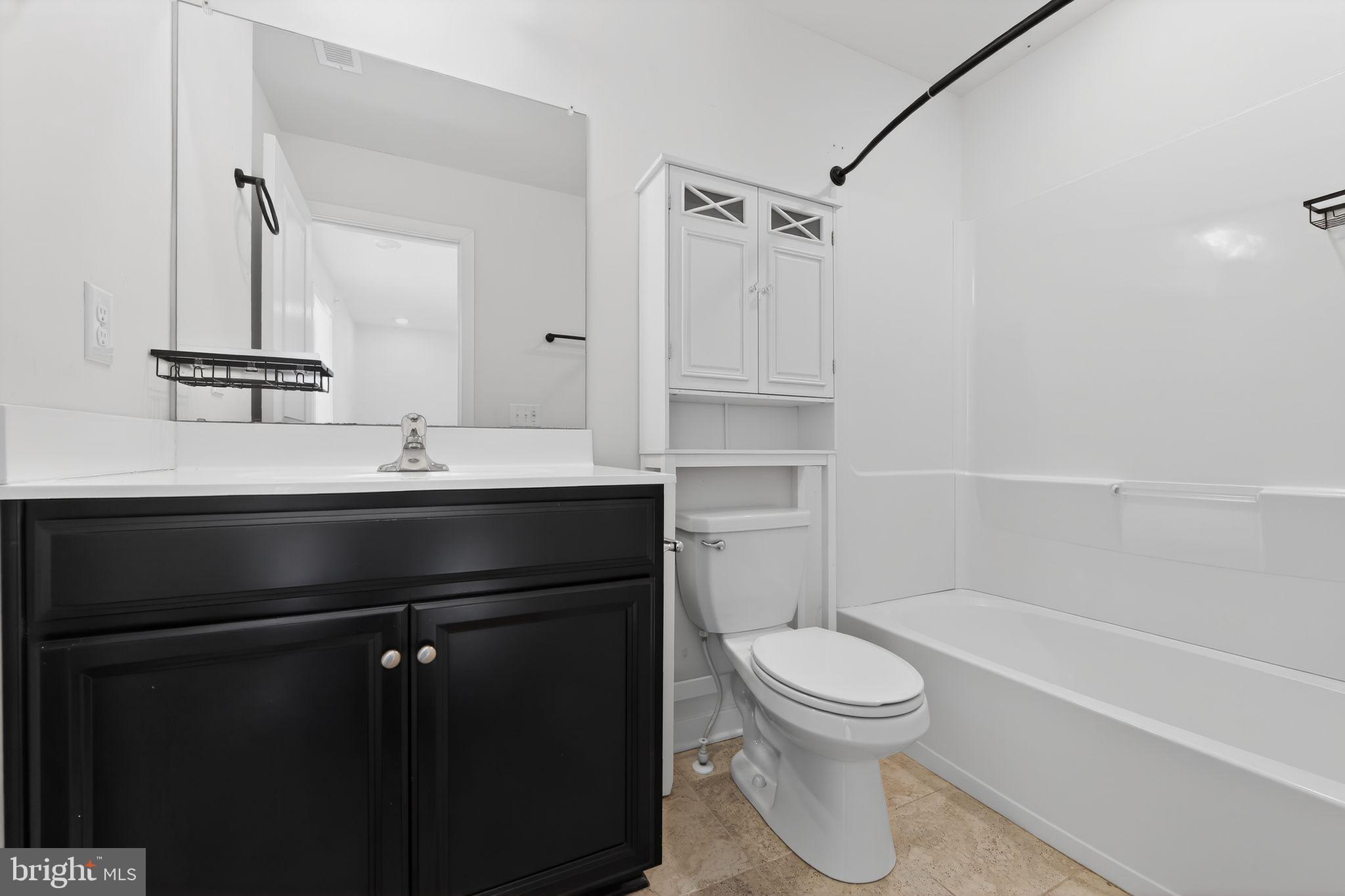 78 Wil-Be Drive Pottstown, PA 19465 - Photo 10 of 18 a bathroom with a sink a toilet and a bathtub