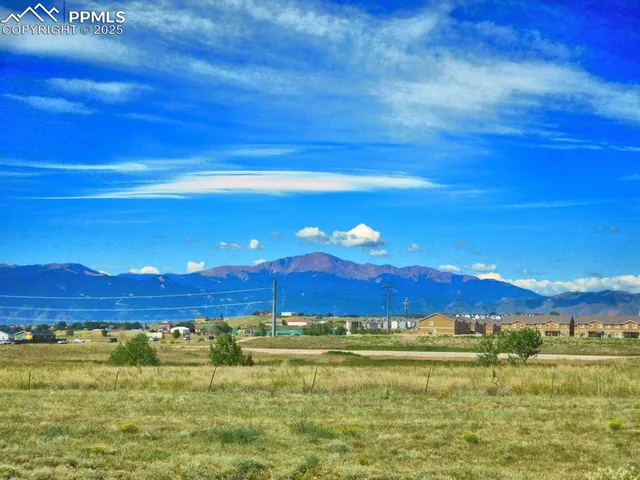 a view of a ocean with sunset