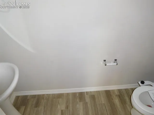 a view of small space with wooden floor