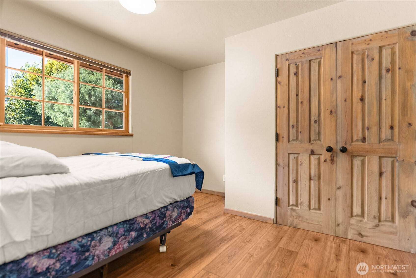 2621 Highway 153 Twisp, WA 98856 - Photo 16 of 40 a bedroom with a bed and a window