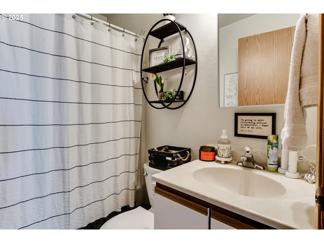 a view of a house with backyard and porch