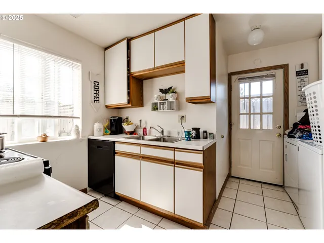 a bathroom with a sink a vanity and a mirror