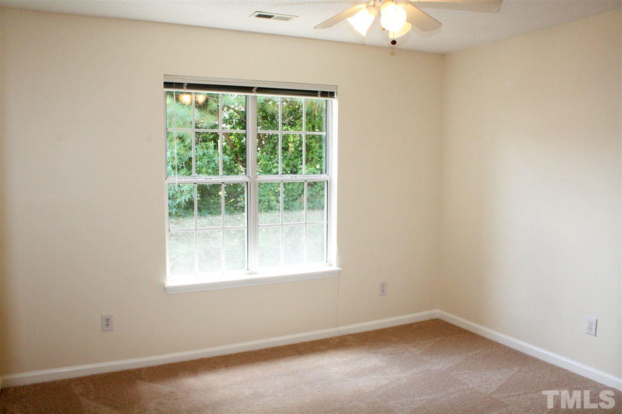 4435 Still Pines Drive Raleigh, NC 27613 - Photo 14 of 19 an empty room with a window