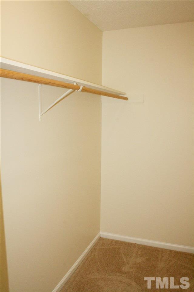4435 Still Pines Drive Raleigh, NC 27613 - Photo 16 of 19 a view of small space with racks on the wall