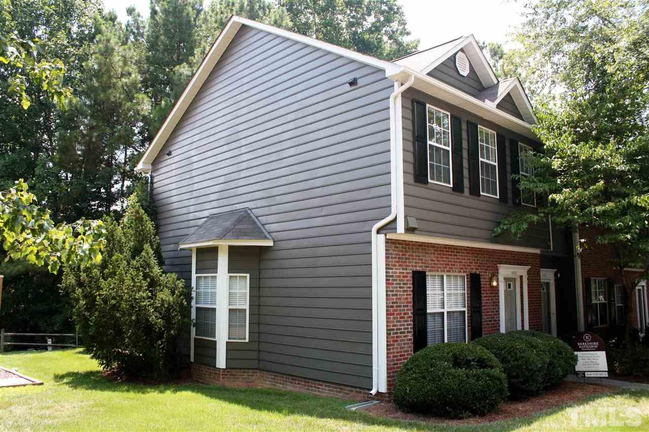 4435 Still Pines Drive Raleigh, NC 27613 - Photo 19 of 19 a view of house with a yard and potted plants