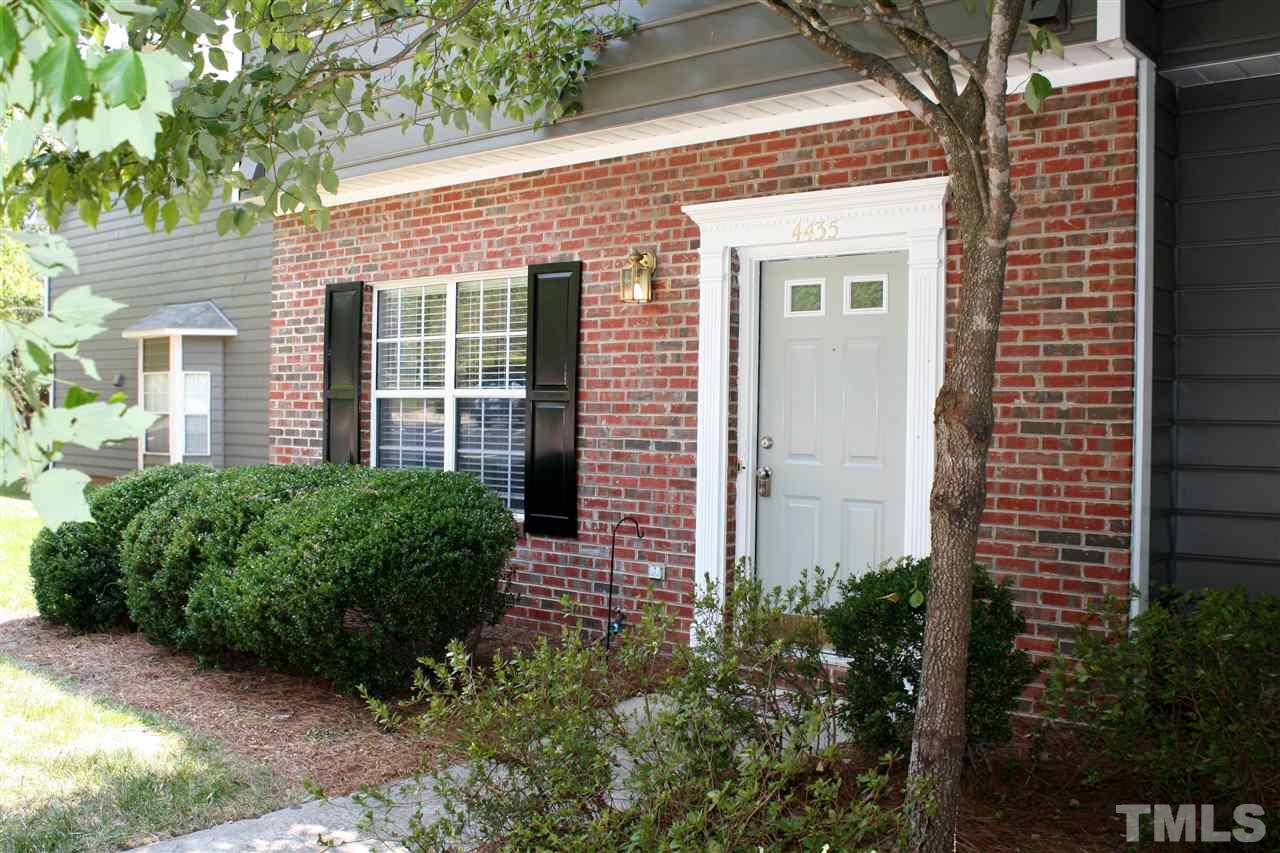 4435 Still Pines Drive Raleigh, NC 27613 - Photo 3 of 19 a front view of a house with garden